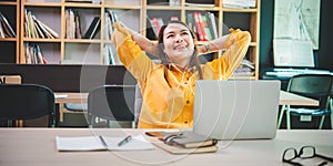 businesswoman is doing a relaxing pose to relieve fatigue after working for a long time