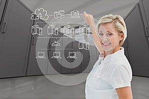 Businesswoman is drawing against data center background
