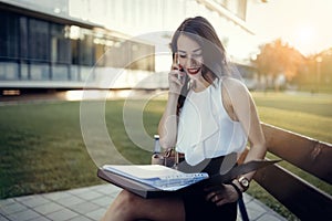 Businesswoman in dress outdoors