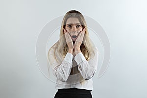 Businesswoman dressed in business style clothing posing for a po