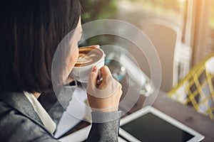 Businesswoman drink coffee on the morning