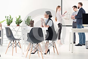 Businesswoman drinking coffee