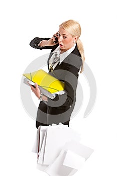 Businesswoman dropping all her papers