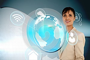 Businesswoman with earth and app interface