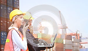 Businesswoman and engineering hold computer or