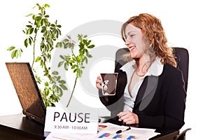 Businesswoman enjoying her coffee-break