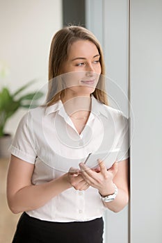 Businesswoman enjoys handy computer organizer