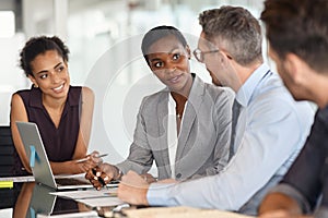 Businesswoman executive explaining graphs in meeting