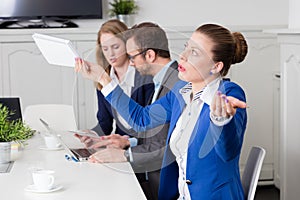 Businesswoman expressing disagreement on a business meeting