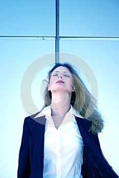 Businesswoman With Eyes Closed Leaning Back