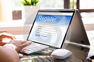 Businesswoman Filling Online Registration Form