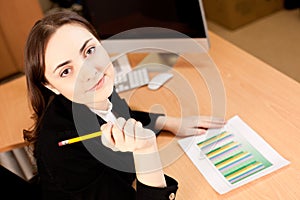 Businesswoman with financial report