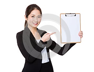 Businesswoman finger point to clipbpoard