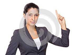 Businesswoman finger point upwards