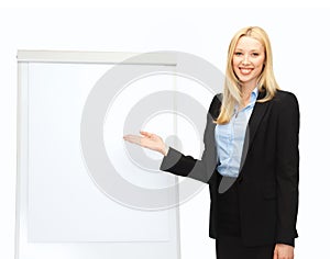 Businesswoman with flipchart in office