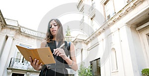 Businesswoman with folder.