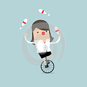 Businesswoman in front of a big data network.Businesswoman juggling while cycling with red nose.