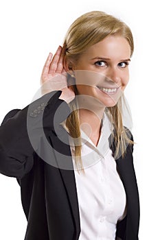 Businesswoman gestures to hear