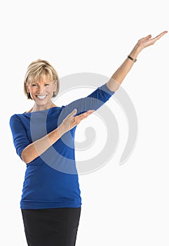 Businesswoman Gesturing Against White Background