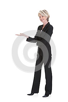 Businesswoman gesturing on white background