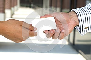 Businesswoman giving a business card