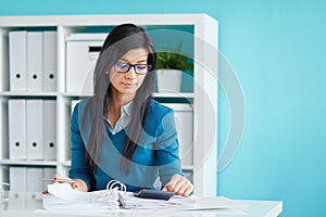 Businesswoman with glasses in office
