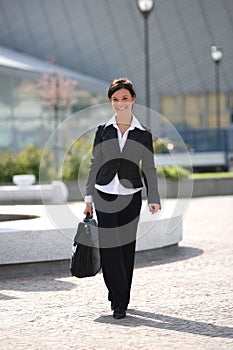 Businesswoman going to office