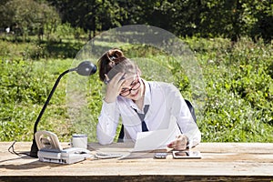 Businesswoman grabs your head, reading a new contract