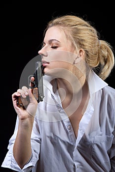 Businesswoman with gun