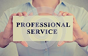 Businesswoman hands holding Professional service sign card