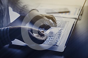 Businesswoman hands using laptop for financial data analyzing counting with saving money concept