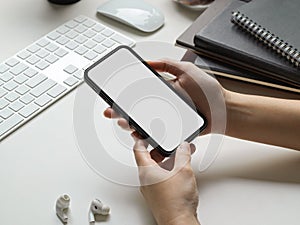 Businesswoman hands using smartphone mockup