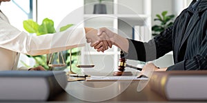 Businesswoman handshake to seal a deal judge female lawyers consultation legal services Consulting in regard to the