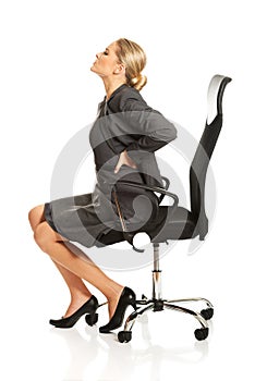 Businesswoman having back pain