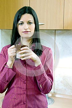 Businesswoman having a break with coffee