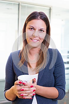 Businesswoman having a coffee break