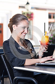 Businesswoman having fun in cafe