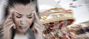 Composite image of businesswoman having an headache