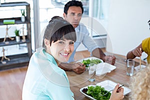 Businesswoman having lunch