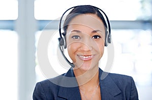 Businesswoman, headset and operator in portrait, customer service and crm in office. Happy person, call centre