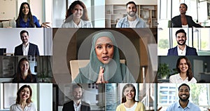 Businesswoman in hijab attire make speech take part in videocall