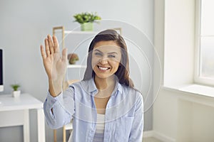 Businesswoman hispanic brunette in casual clothes serious looking at the camera at home in the office. photo