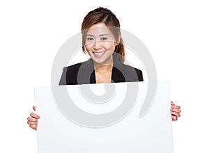 Businesswoman hold with blank board