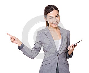 Businesswoman hold with tableta and pen point up photo