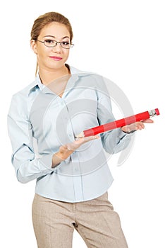 Businesswoman holding big pencil.