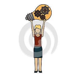 Businesswoman holding bulb with gears