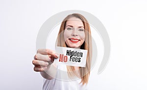 A businesswoman holding a business card with the words, No Hidden Fees, written on it.