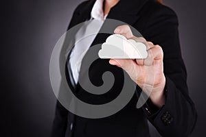 Businesswoman Holding Cloud Computing Icon