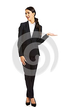 Businesswoman holding copyspace on the left hand