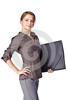 Businesswoman holding a folder and smiling